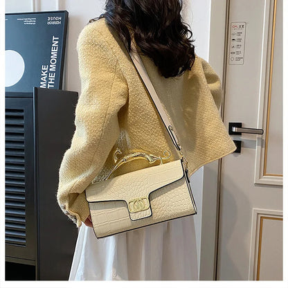 Stylish Leather Crossbody Bag with Designer Metal Handle